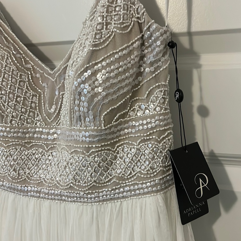 Beautiful formal/wedding gown. New with tags, never worn!